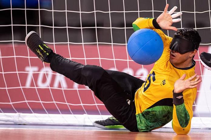 Josemarcio Sousa blocks the ball from going into the net