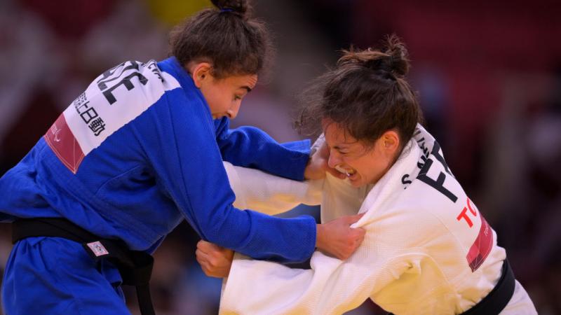 Two female judo athletes in action at Tokyo 2020