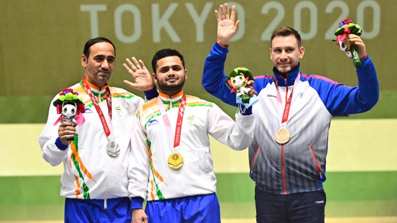 Indian shooters Manish Narwal and Singhraj Adana share the podium