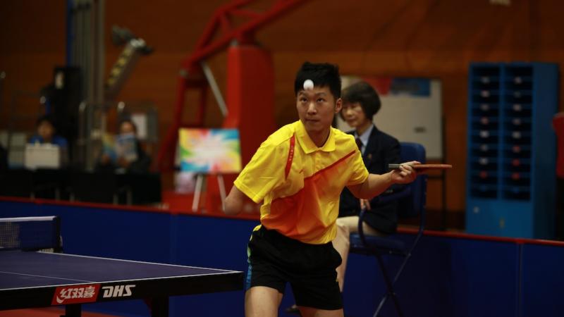 Chinese player Ge Yang takes a shot