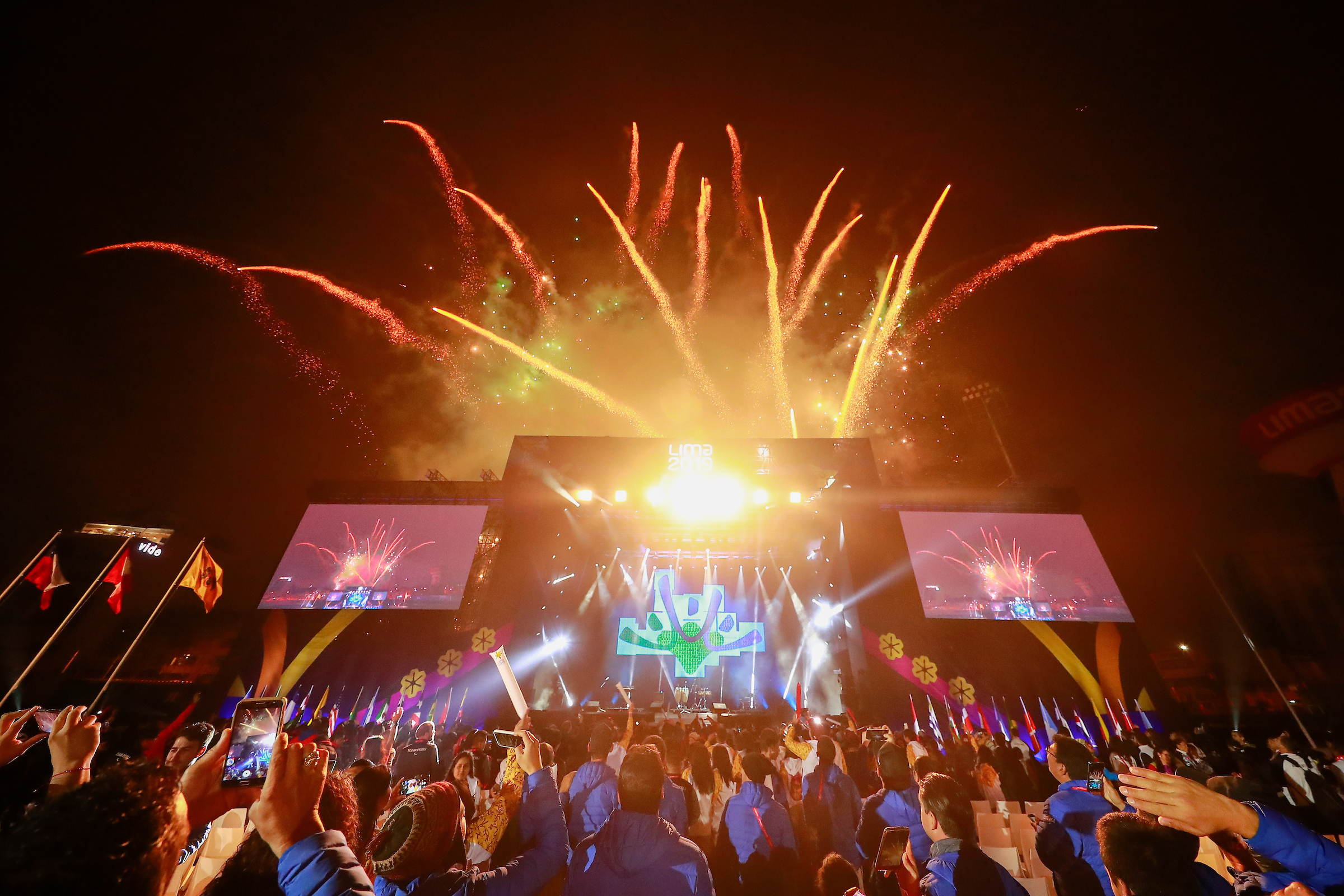 fireworks exploding over a stage