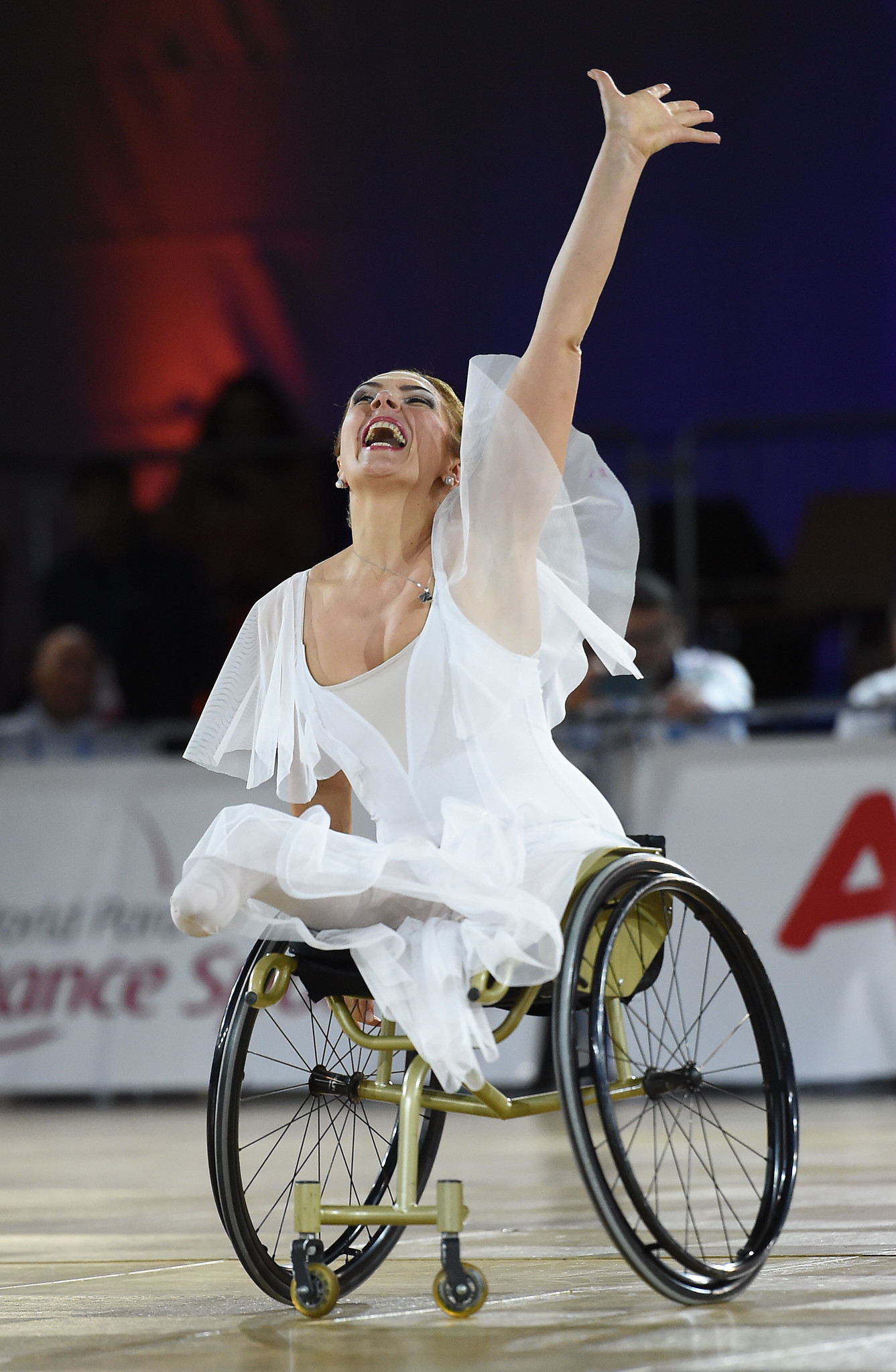 Woman in wheelchair performs expresses emotion in dance
