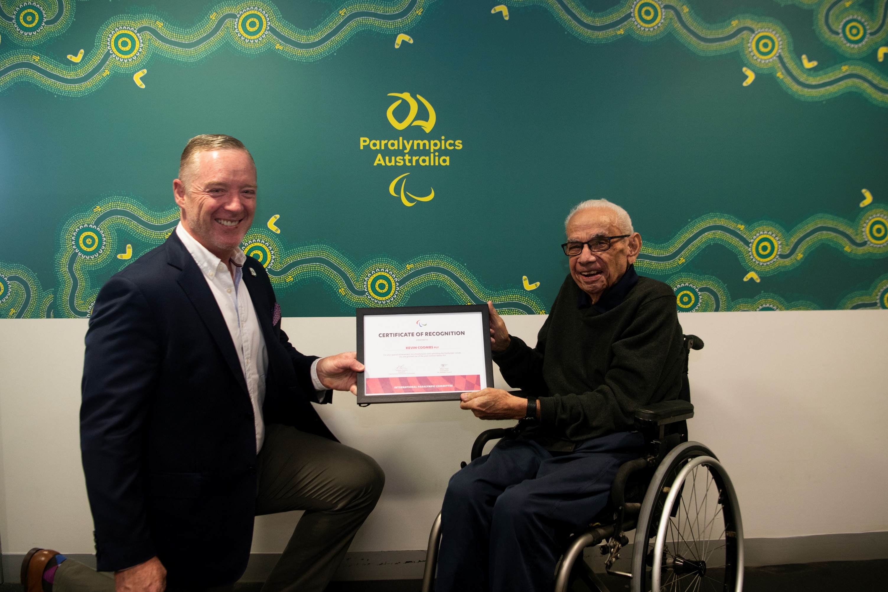 Kevin Coombs OAM receives PLY certificate from Jock O’Callaghan, President of Paralympics Australia