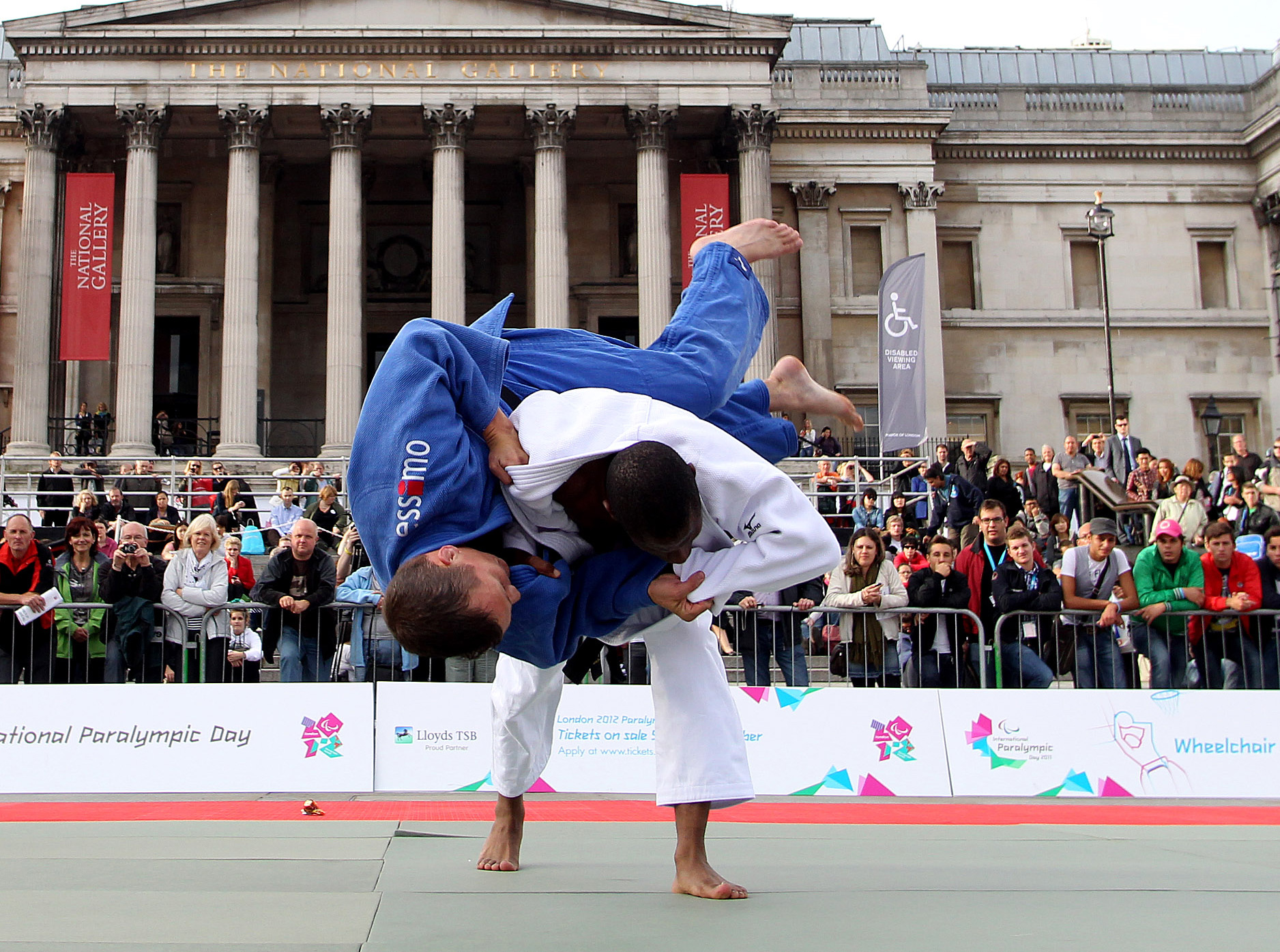 A pictures of 2 mens in action during a Judo demonsrtation