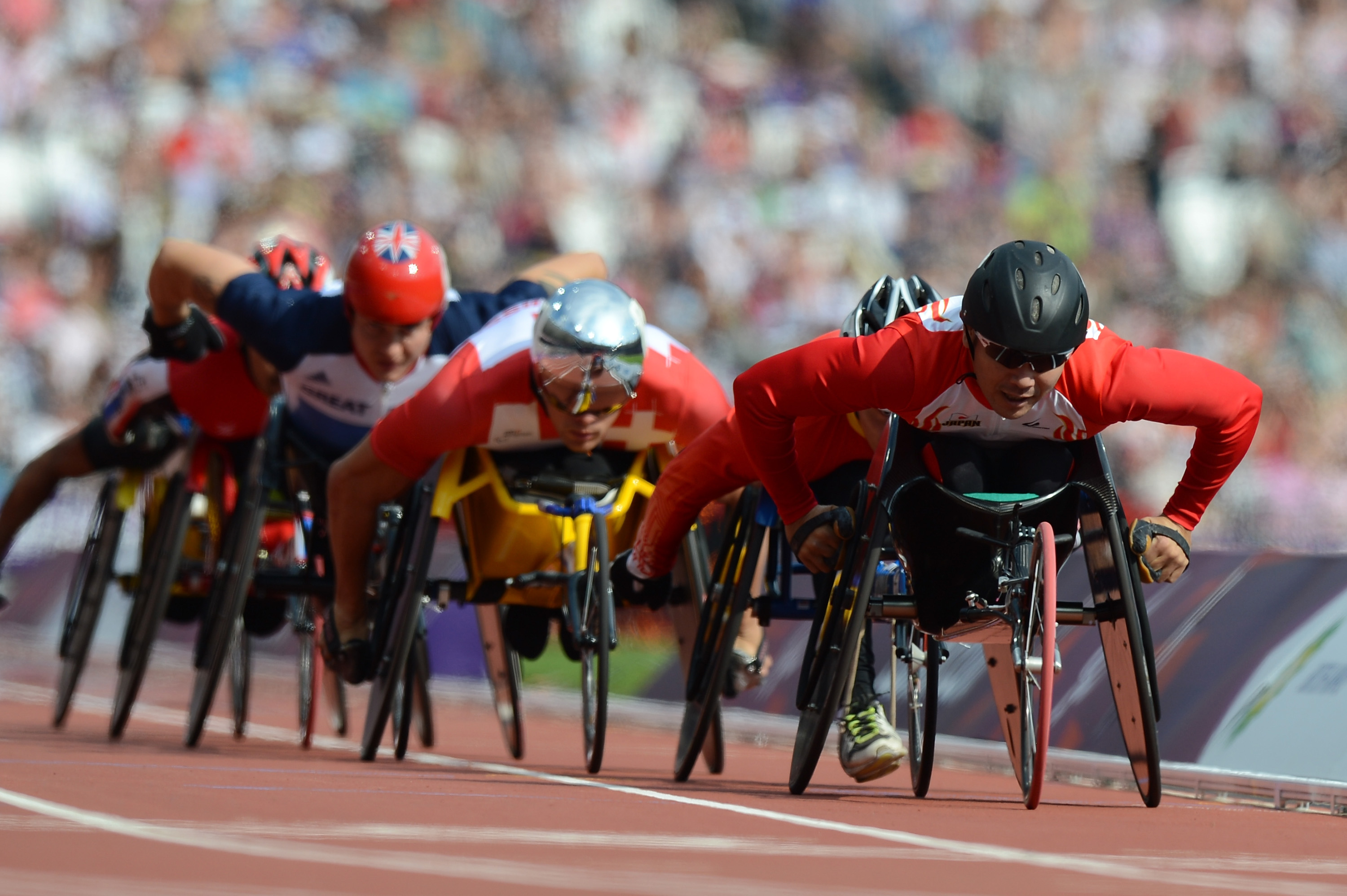 A picture of men in wheelchairs during an athletics race