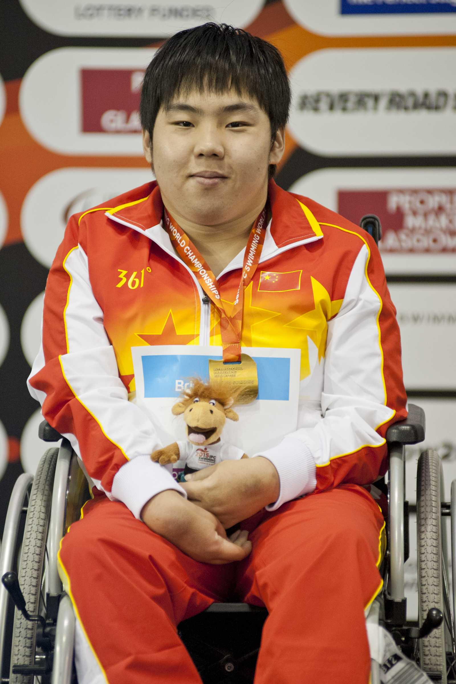 Man in wheelchair on the podium