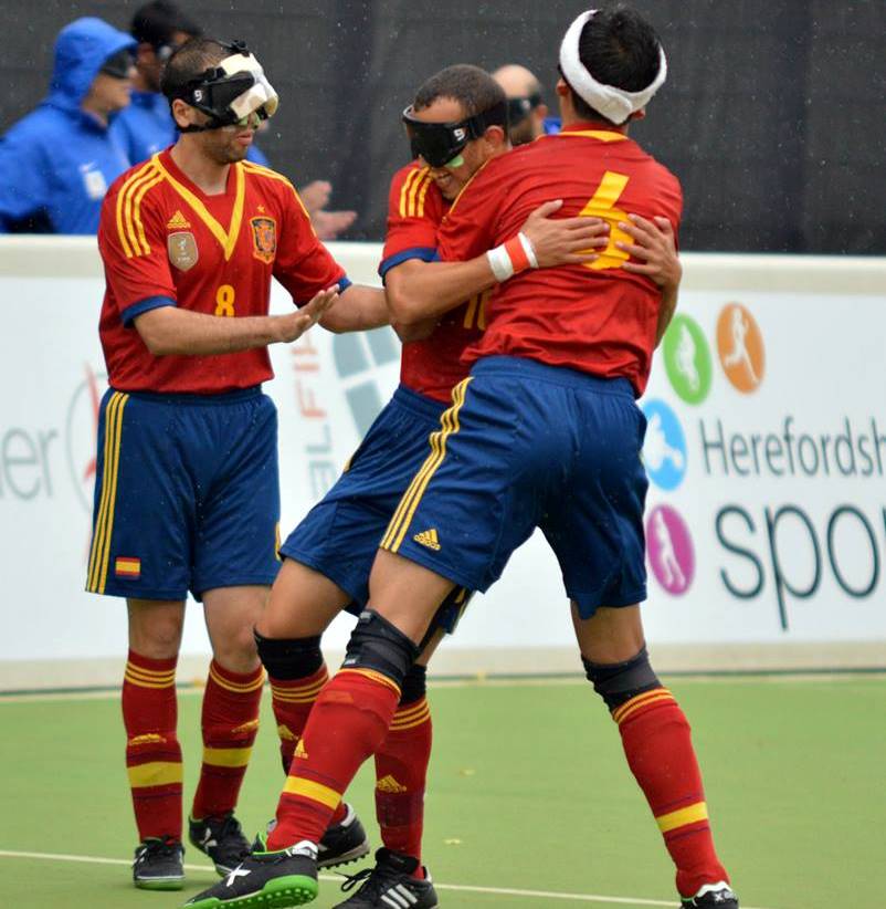 Spanish players celebrate a goal.