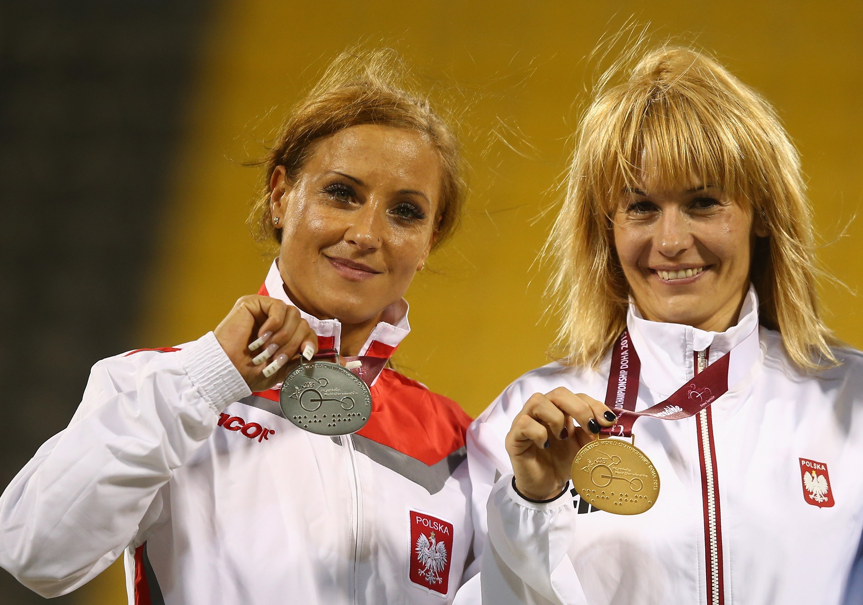 female Para athletes Arleta Meloch and Barbara Niewiedzial on the podium