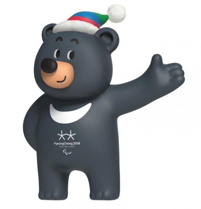 A black bear, the mascot of the PyeongChang 2018 Paralympic Games, raises its left hand