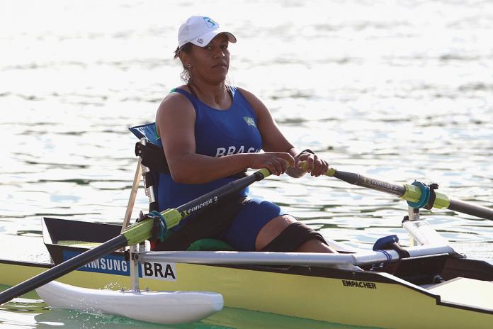A female Para rower in action