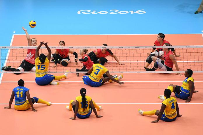 Two female sitting volleyball teams in competition at Rio 2016