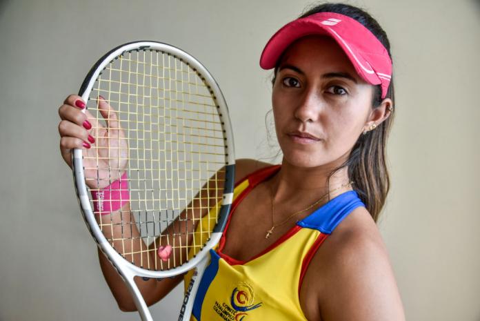 Angelica Bernal of Colombia poses for a photo with her racquet.