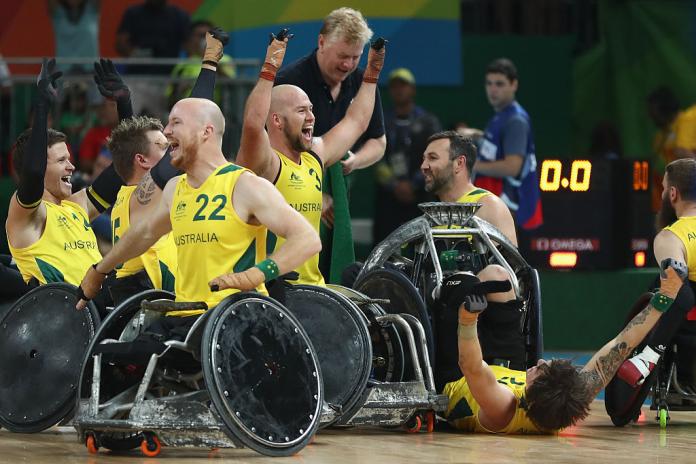 Wheelchair rugby athletes celebrate after winning the Rio 2016 Paralympic Games