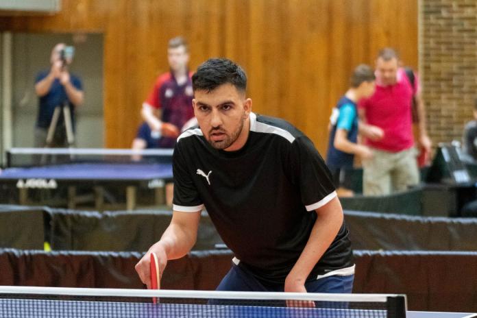 Sayed Amir Hossein Pour, a member of the Refugee Paralympic Team, competes in Para table tennis