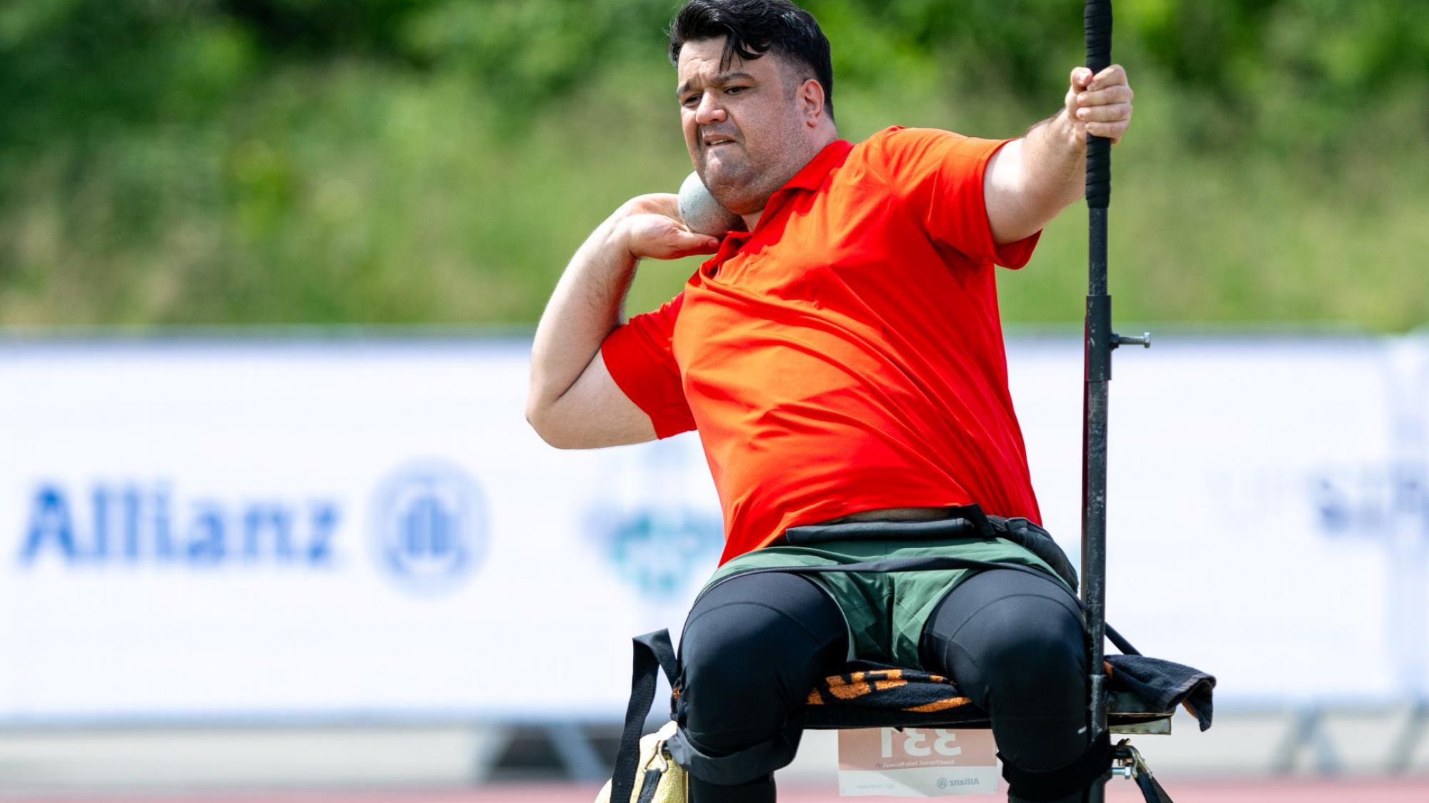 Salman Abbariki, a member of the Refugee Paralympic Team at Paris 2024, prepares to throw