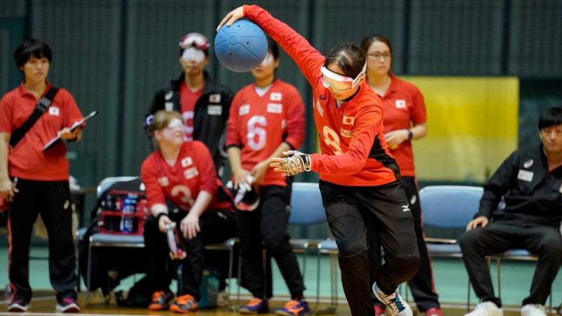 Japanese female goalballer about to throw the ball