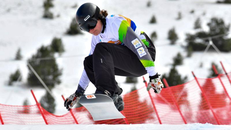 A man snowboarding 