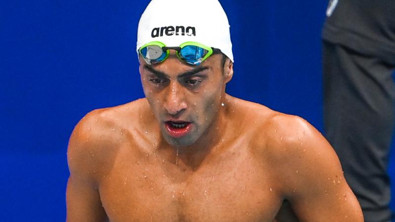 Ibrahim Al Hussein coming out of the pool after a race