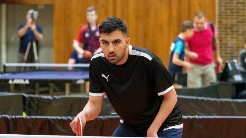 Sayed Amir Hossein Pour, a member of the Refugee Paralympic Team, competes in Para table tennis