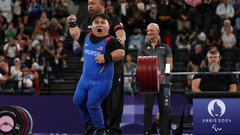 An athlete reacts with ecstacy
