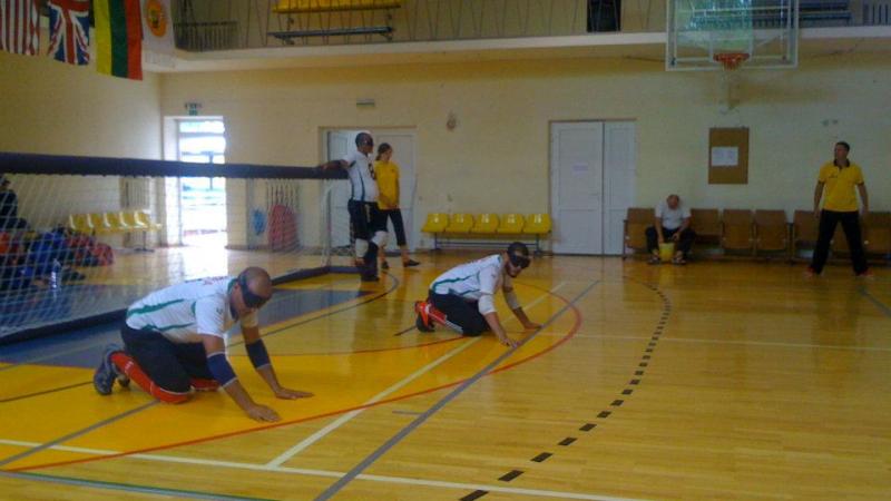 Two men playing goalball at the Algerian Goalball Championships 2013