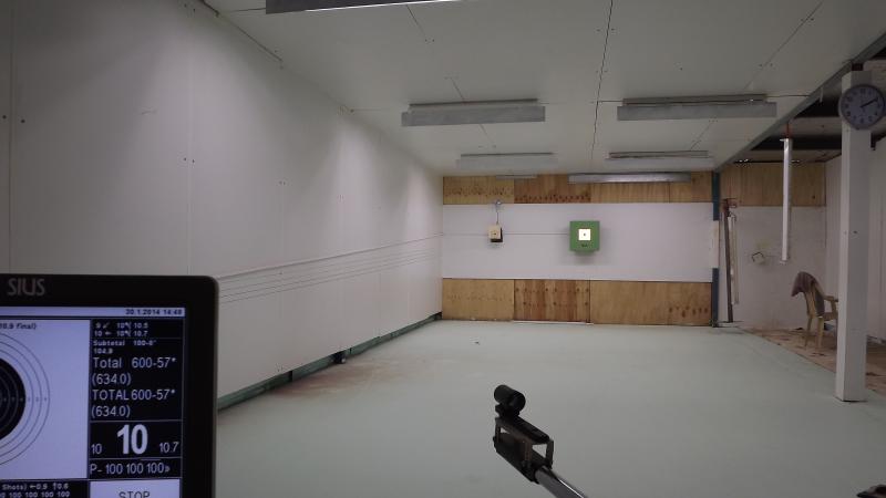 Jason Maroney built his own rifle range with a world class electronic target machine in his shed