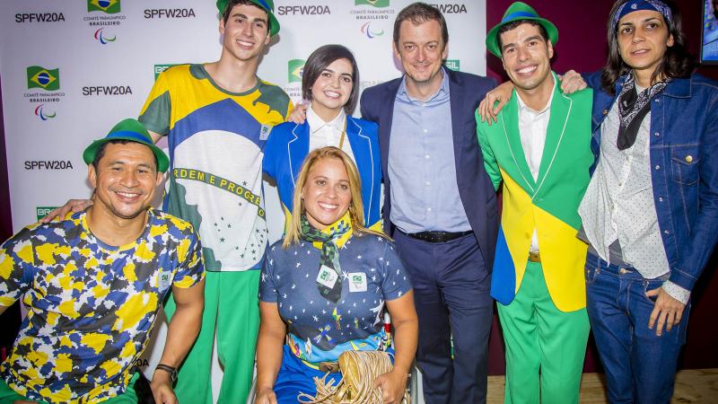 Andrew Parsons, President of the Brazilian Paralympic Committee with Brazilian athletes at the Sao Paulo Fashion Week