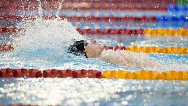 Swimmer doing backstroke