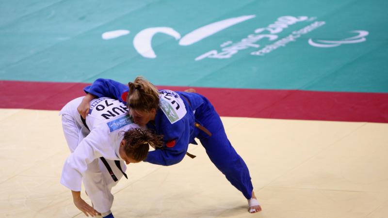 two judo players competing