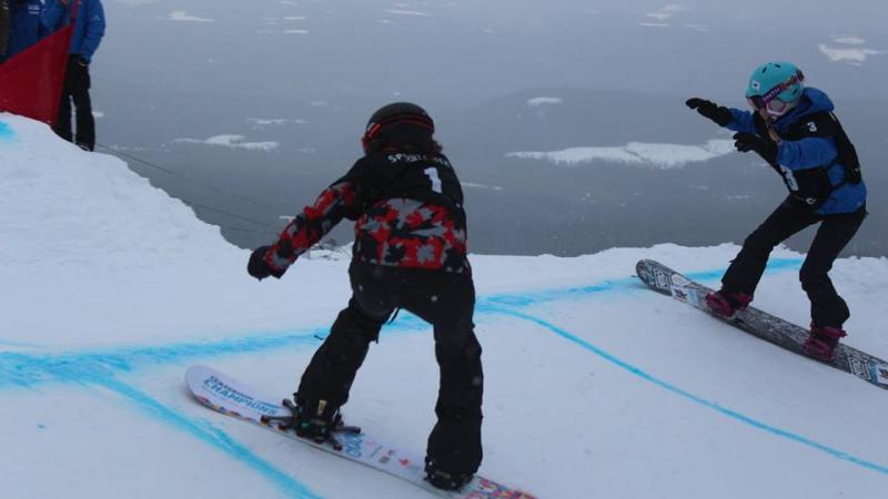 Two snowboarders on the slope