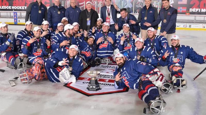 A Para ice hockey team celebrate their victory