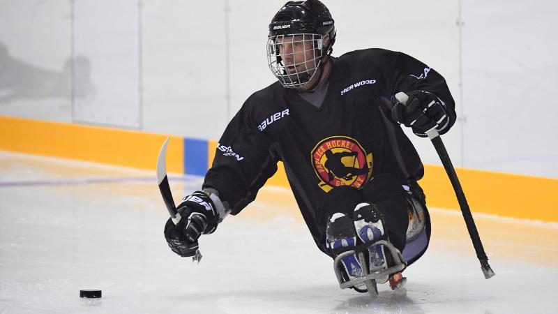 a Para ice hockey player on the ice