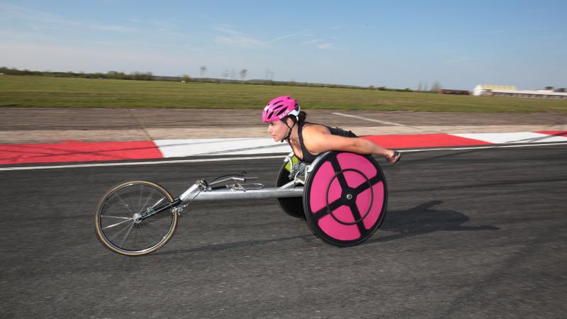 Woman in racing chair