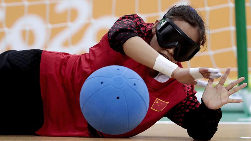 China's Fengqing Chen saves a goal in the Rio 2016 goalball competition 