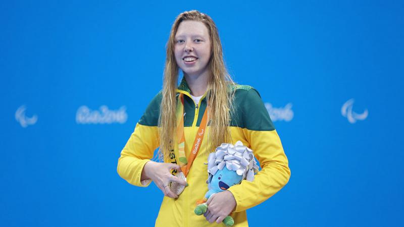 Lakeisha Patterson celebrates on the podium at Rio 2016.