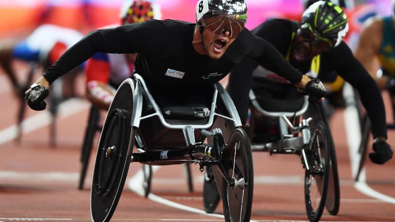 Switzerland's Marcel Hug celebrates after taking the 1,500m T54 world title at London 2017.