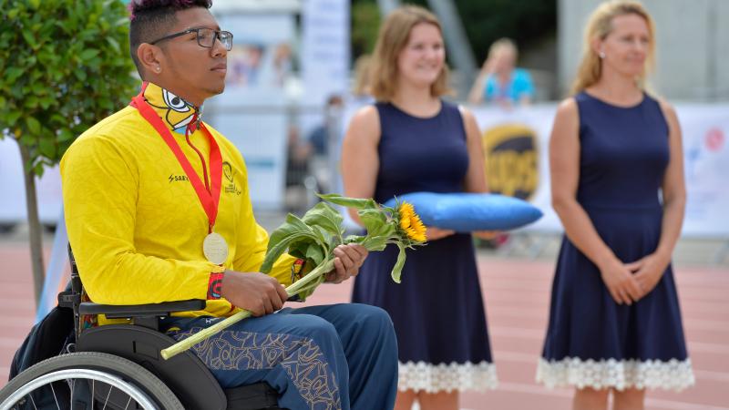 a male Para athlete during a medal ceremony