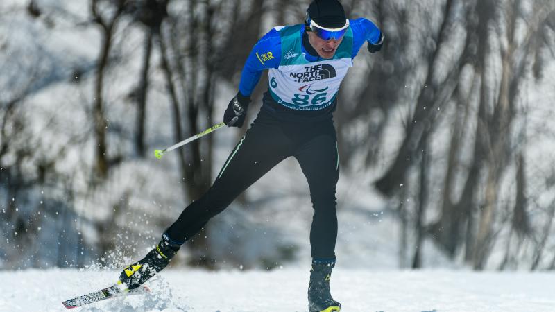 Athlete skiing standing