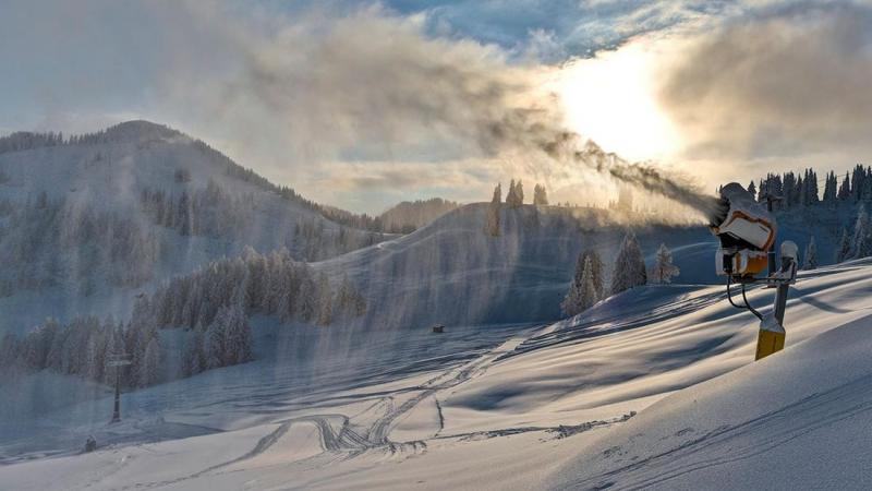 A snow making machine in the middle of snow