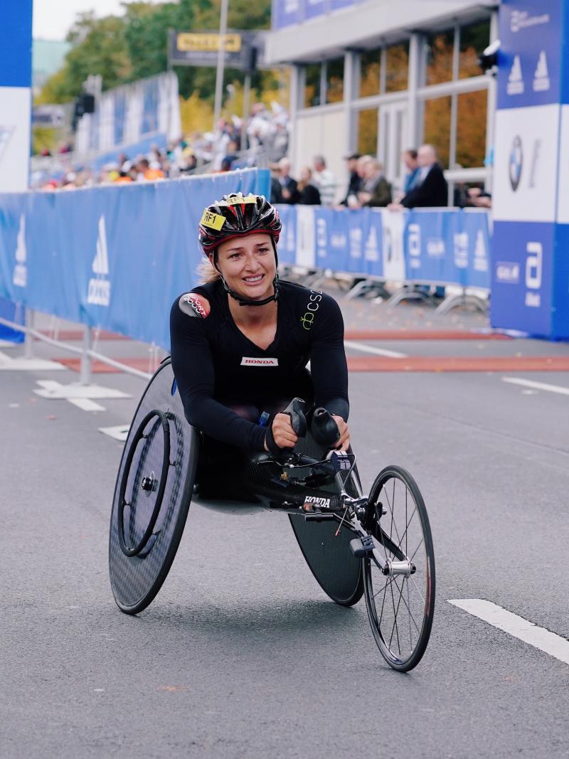 A female wheelchair racer on the streets of Berlin