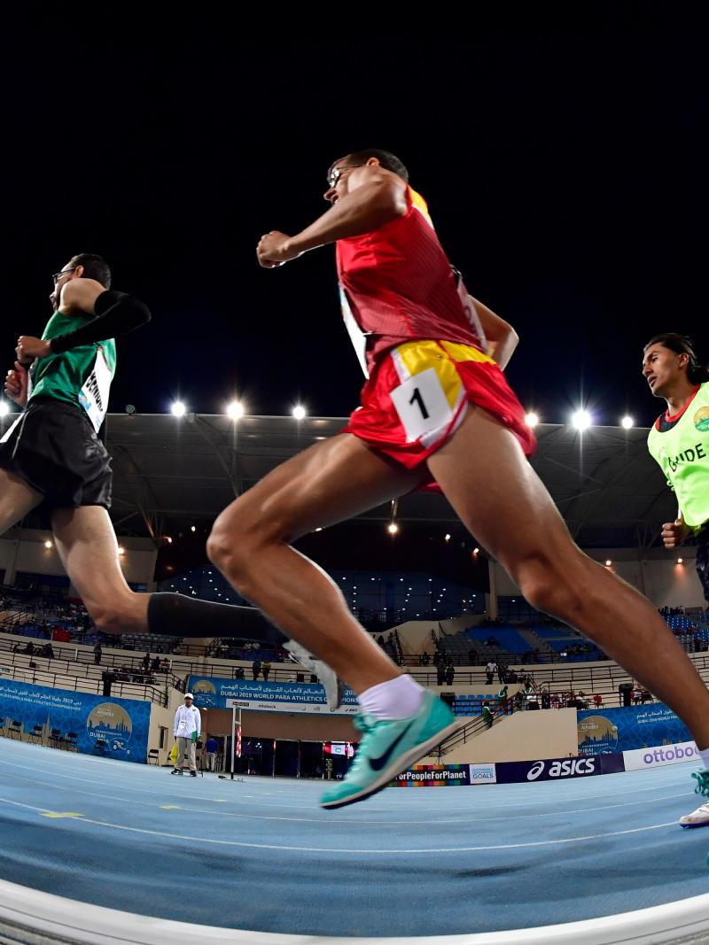 Athletes run through the track at the Dubai 2019 World Championships