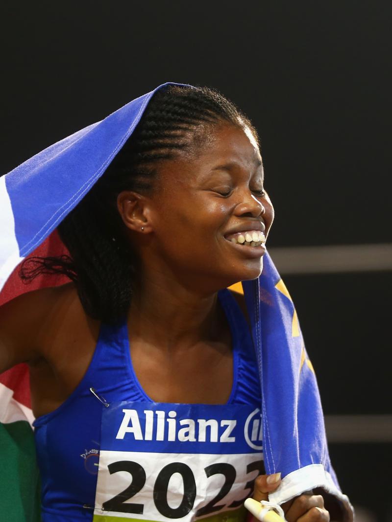 Johanna Benson holding the Namibian flag