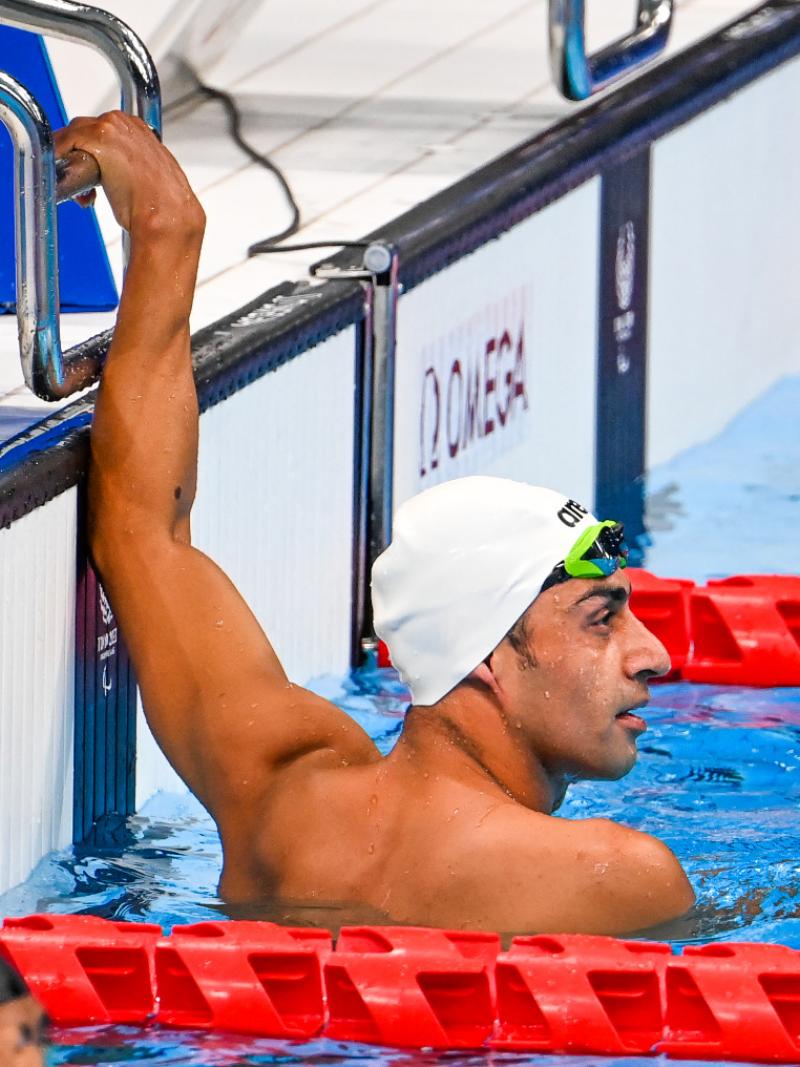 Refugee Paralympic athlete Ibrahim Al Hussein in the pool after a race