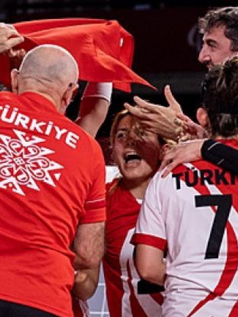 Turkish female goalball team celebrates after defending the Paralympic title in Tokyo.