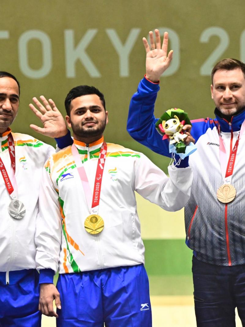 Indian shooters Manish Narwal and Singhraj Adana share the podium