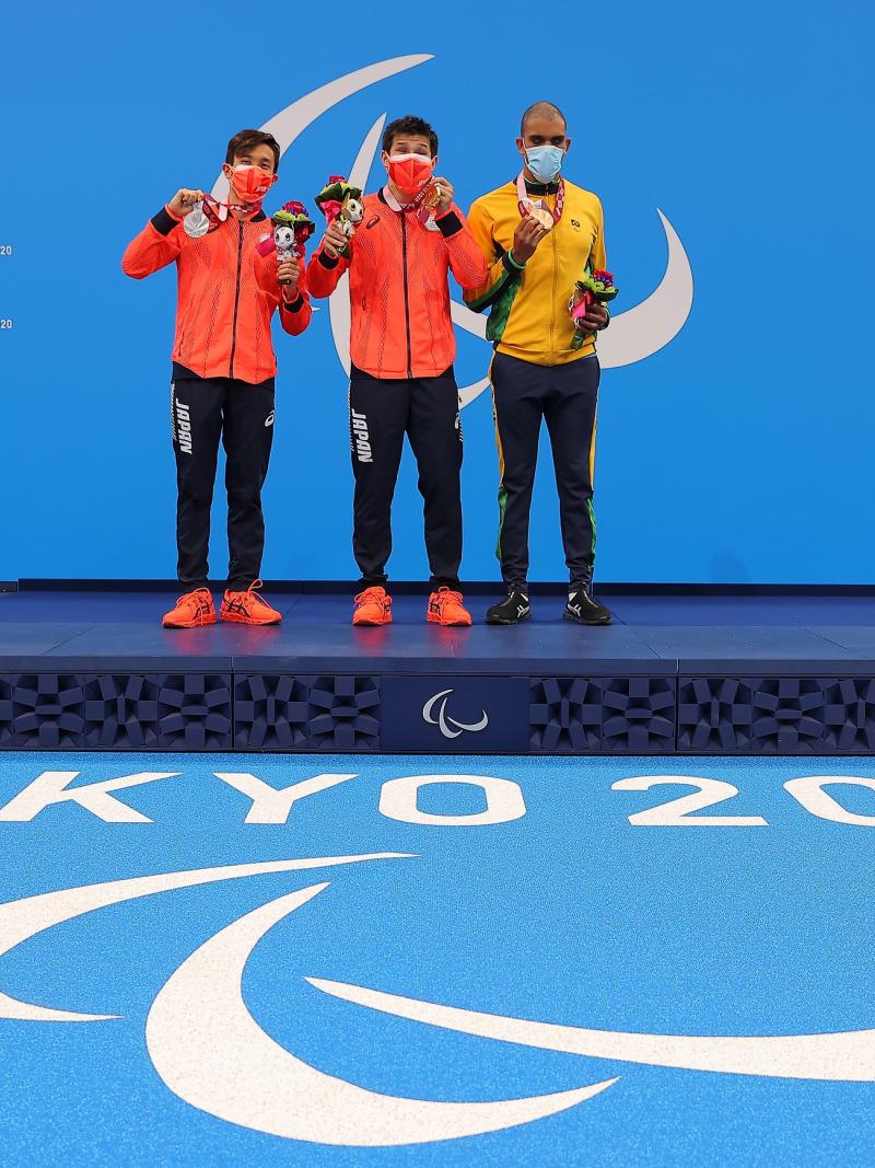 Keiichi Kimura stands on the top of the podium at Tokyo 2020 following his gold medal performance