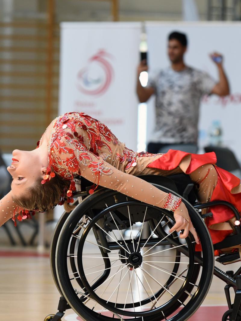 Image of a female dancer in her wheelchair