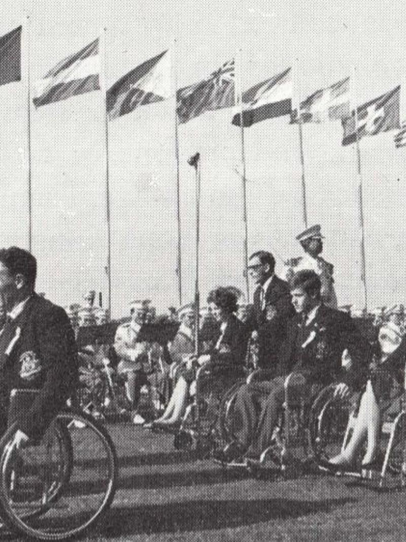 A delegation enters a stadium