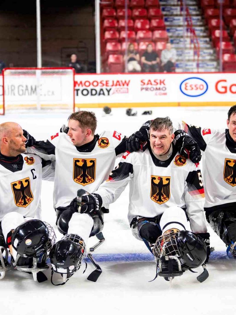 Athletes strike a pose for a group picture