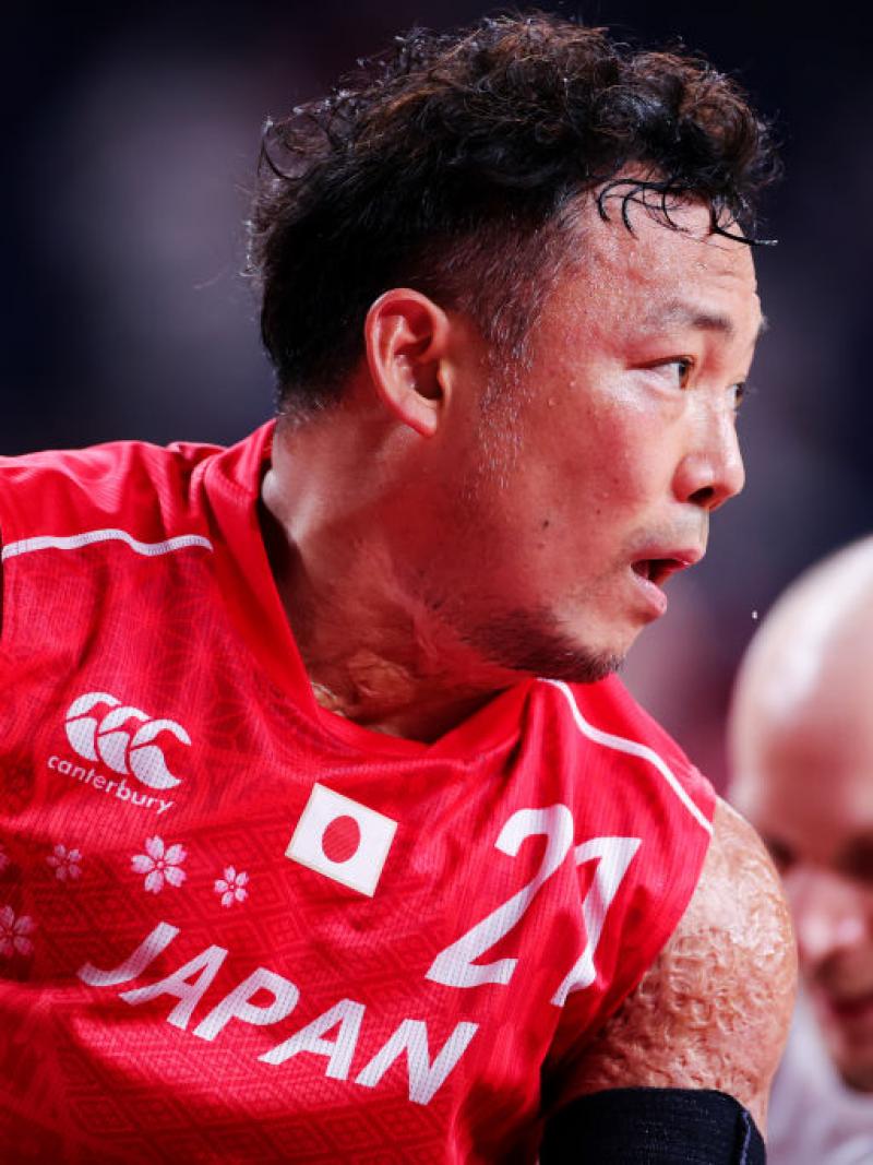 A close-up image of a male wheelchair rugby player